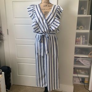 Blue and White Striped Jumpsuit with Ruffled Shoulders and Tie Waist